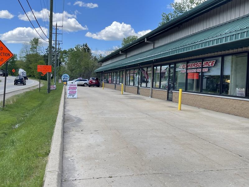 Storefront walkway along the front of the building