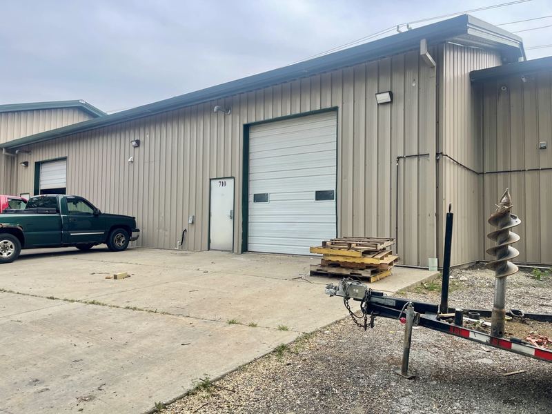 Back of the building with parking