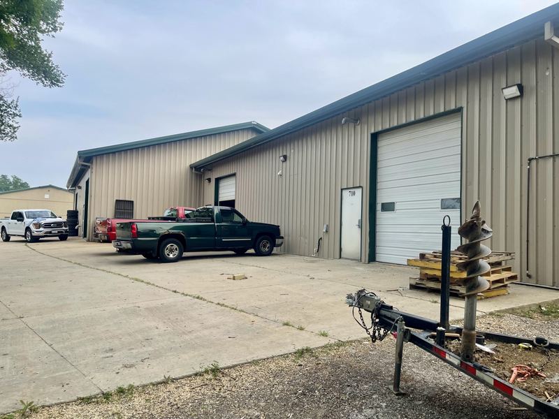 Rear of the building looking down the row of overhead doors